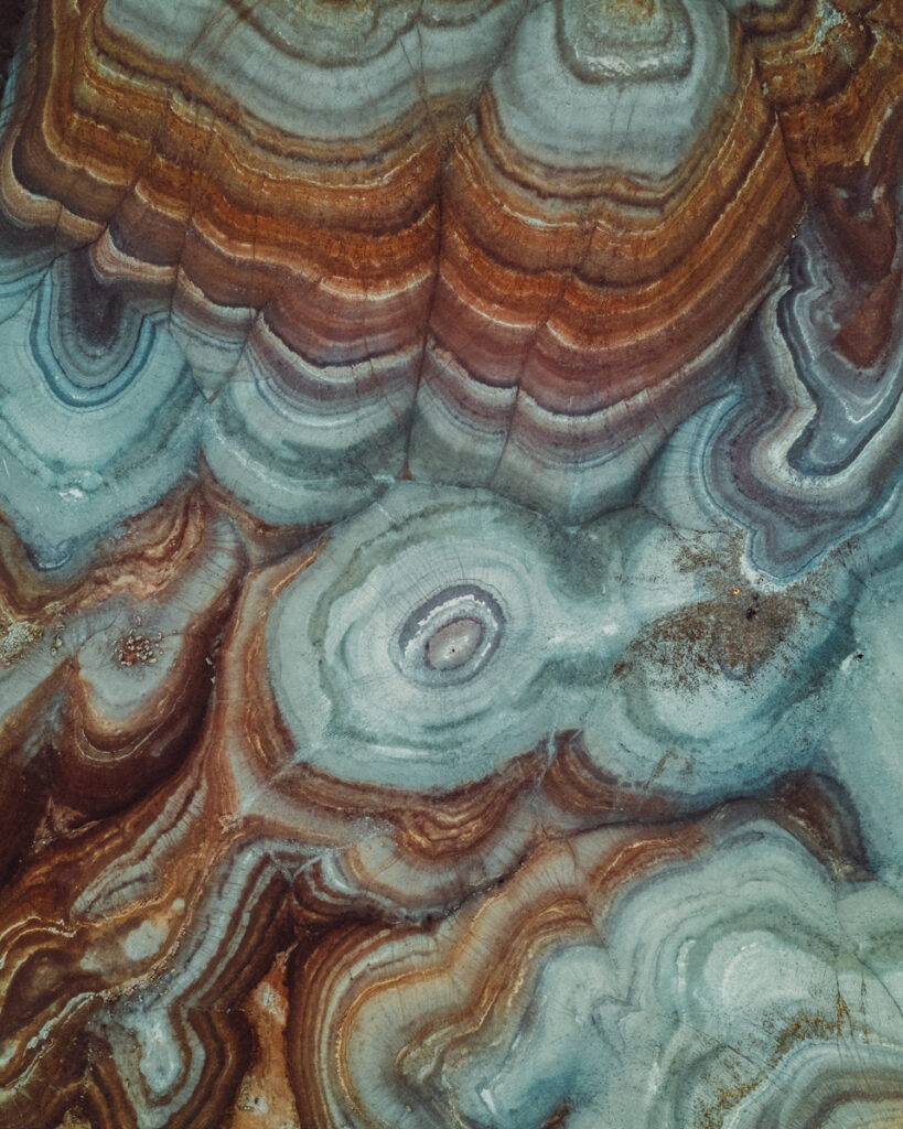 Hanksville Utah remains an extremely underrated Utah Road Trip destination. Explore slot canyons and see wild landscapes that look like Mars. Factory Butte, Bentonite Hills, Leprechaun canyon, temple of the sun