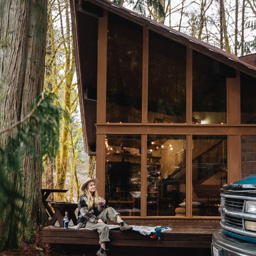 Sky Cabin Airbnb Skykomish is a getaway you don't want to miss. Midcentury angles, cozy touches and nearby hikes make this the perfect stay.